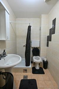 Kopalnica v nastanitvi Apartman Dunja