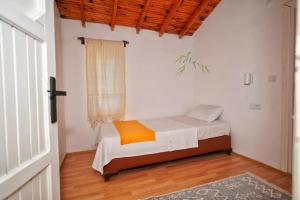 Postel nebo postele na pokoji v ubytování Yedi Butik Hotel