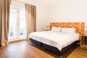 Postel nebo postele na pokoji v ubytování Gilgara Retreat