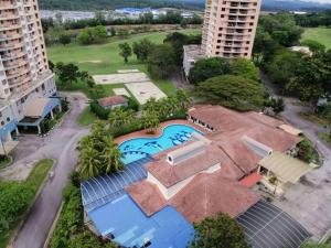 an aerial view of a resort with a swimming pool at D Savoy A Famosa 2 BR by Oasis in Kampong Pulau Sebang