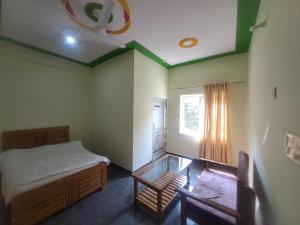 Postel nebo postele na pokoji v ubytování Hotel Swagat Sarovar