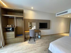 מיטה או מיטות בחדר ב-NHA TRANG WHITE PEARL OceanView Panorama Residence