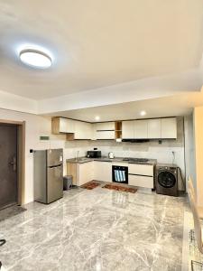 Kuchyň nebo kuchyňský kout v ubytování Apple Tree Apartment close to the Airport & SGR Terminal Nairobi