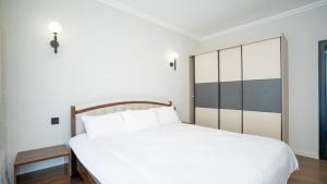 Postel nebo postele na pokoji v ubytování Apple Tree Apartment close to the Airport & SGR Terminal Nairobi