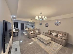 Posezení v ubytování Apple Tree Apartment close to the Airport & SGR Terminal Nairobi