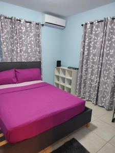 Postel nebo postele na pokoji v ubytování Cayenne home + 5 fotografií
