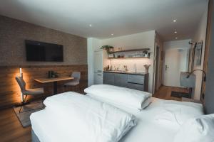 Posteľ alebo postele v izbe v ubytovaní Seekarspitz Boutique Appartements
