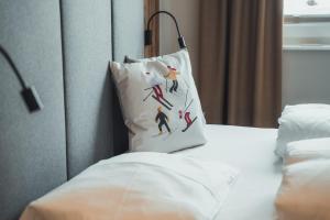 Posteľ alebo postele v izbe v ubytovaní Seekarspitz Boutique Appartements