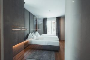 Posteľ alebo postele v izbe v ubytovaní Seekarspitz Boutique Appartements