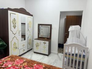 Postel nebo postele na pokoji v ubytování Burj al haya apartment