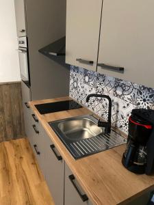 Eldhús eða eldhúskrókur á Appartement Brettljause Ferienhaus Fuenf Sinne