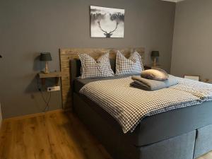 Postel nebo postele na pokoji v ubytování Appartement Brettljause Ferienhaus Fuenf Sinne