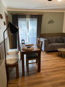 Setusvæði á Appartement Brettljause Ferienhaus Fuenf Sinne