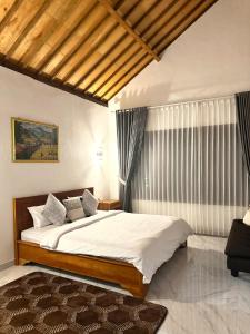 Dira Bungalows客房内的一张或多张床位