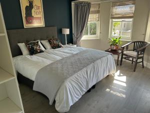 Ένα ή περισσότερα κρεβάτια σε δωμάτιο στο Mont Vue Manor - guesthouse