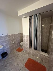 Koupelna v ubytování Hotel Talsi