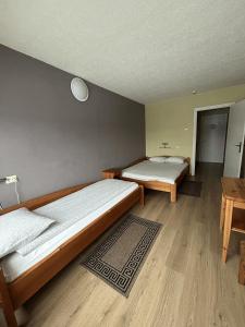 Postel nebo postele na pokoji v ubytování Hotel Talsi