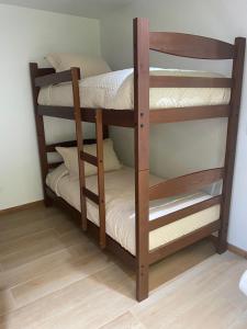 Postel nebo postele na pokoji v ubytování Boker Tov Pucón