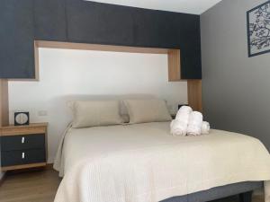 Postel nebo postele na pokoji v ubytování Boker Tov Pucón