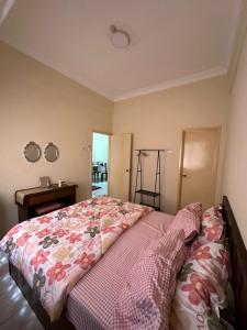 Ένα ή περισσότερα κρεβάτια σε δωμάτιο στο DHW Homestay