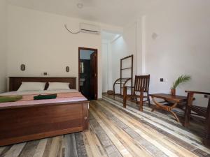 Letto o letti in una camera di Caspian Mirissa