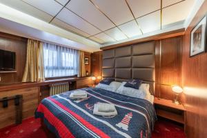 Postel nebo postele na pokoji v ubytování Botel Albatros