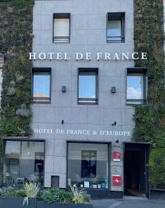 a building with a sign that reads hotel de france at Cit'Hotel Hôtel de France et d'Europe in Concarneau