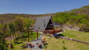 an overhead view of a house with a roof at Cabana BlackRock in São João da Aliança