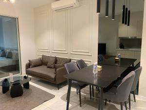 Posezení v ubytování Quill Residences Service Suites By BR