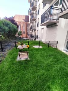 Zahrada ubytování River House - Apartament z ogródkiem