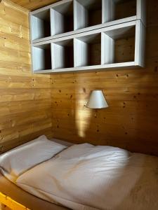 Łóżko lub łóżka w pokoju w obiekcie Walters Hütte
