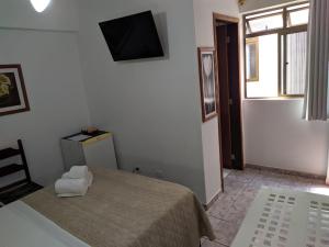 Postel nebo postele na pokoji v ubytování Hotel Nautico