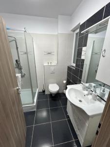 Ένα μπάνιο στο Apartament Teddy