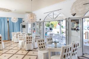 Restoran või mõni muu söögikoht majutusasutuses Aphrodite Beach Hotel Corfu