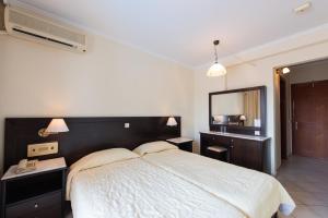 Voodi või voodid majutusasutuse Aphrodite Beach Hotel Corfu toas