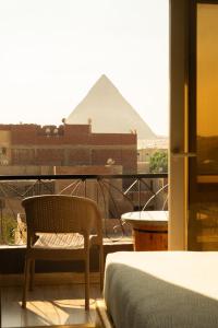 Posezení v ubytování Brass Jimmy Pyramids Hotel, Giza, Egypt