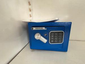 a blue mailbox with a pen in it at Le Terrazze Beachfront, balcony, parking, private access Beach in Torvaianica
