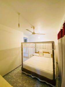 Letto o letti in una camera di Lake View Villa - Tangalle