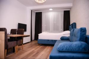 Postel nebo postele na pokoji v ubytování Mecks apartmani