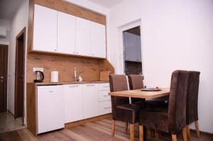 Kuchyň nebo kuchyňský kout v ubytování Mecks apartmani