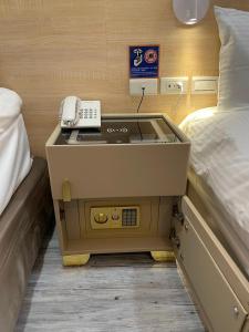 เตียงในห้องที่ 成都壹壹壹商旅