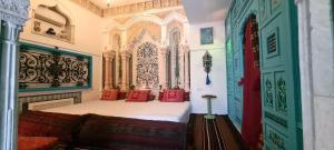 Postel nebo postele na pokoji v ubytování Dreaming room - Sidi Bou Saïd