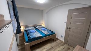 Postel nebo postele na pokoji v ubytování Apartmán Dako