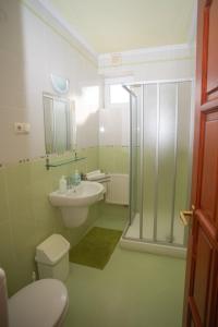 Kúpeľňa v ubytovaní Kondics Apartmanház