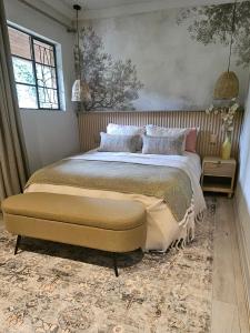 Ένα ή περισσότερα κρεβάτια σε δωμάτιο στο Manchester Farmstay