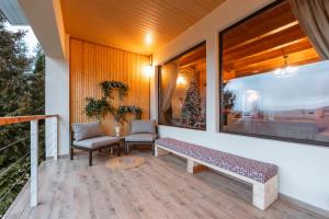 Balkón nebo terasa v ubytování Chalet Belle Vue