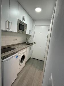 Kuchyň nebo kuchyňský kout v ubytování Loft Calypso