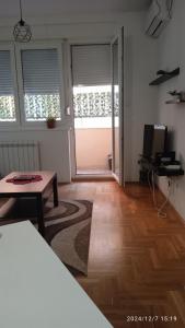 TV a/nebo společenská místnost v ubytování Apartman Sunce