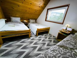 Ένα ή περισσότερα κρεβάτια σε δωμάτιο στο Andrica Sokak