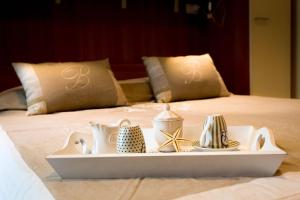 Una cama o camas en una habitación de Sul Mare Smith